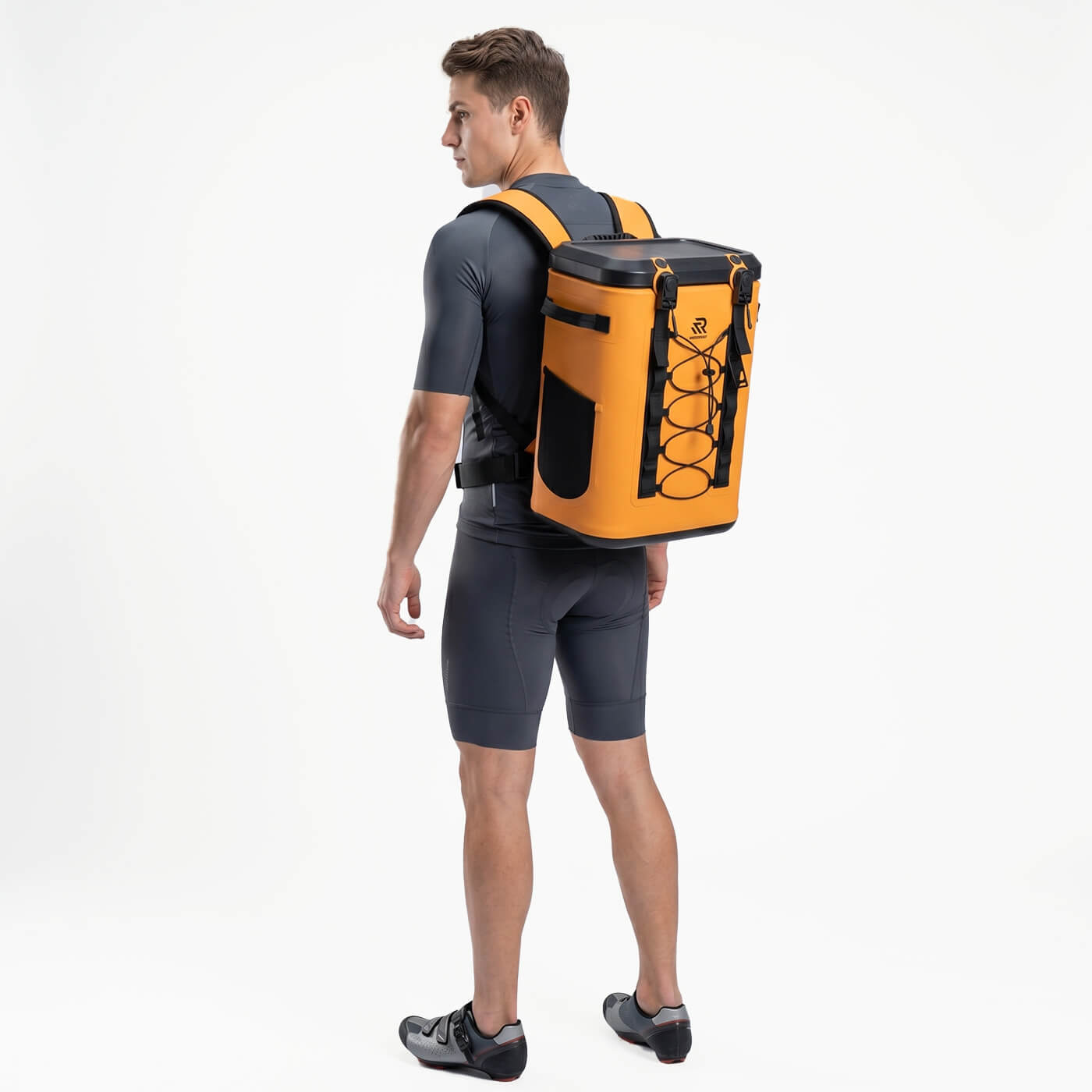 Back view of a man wearing a Rivonova 24can magnetic soft cooler#Color_Orange