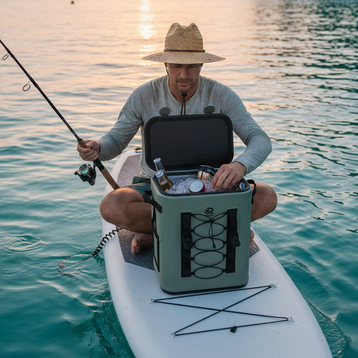 Quickly retrieve a beverage from the RIVONOVA magnetic soft backpack cooler by opening the lid with one hand.