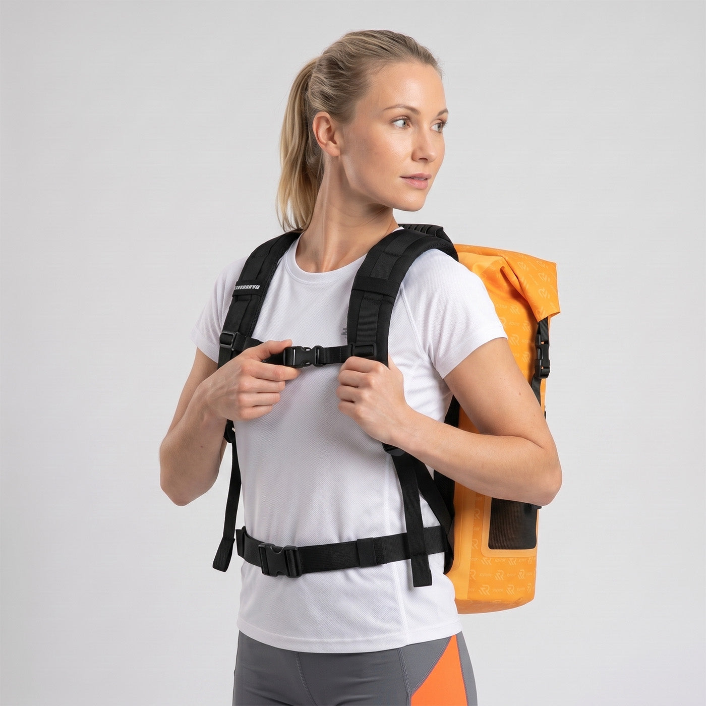 Rivonova waterproof roll-top backpack cooler black with adjustable chest and waist straps