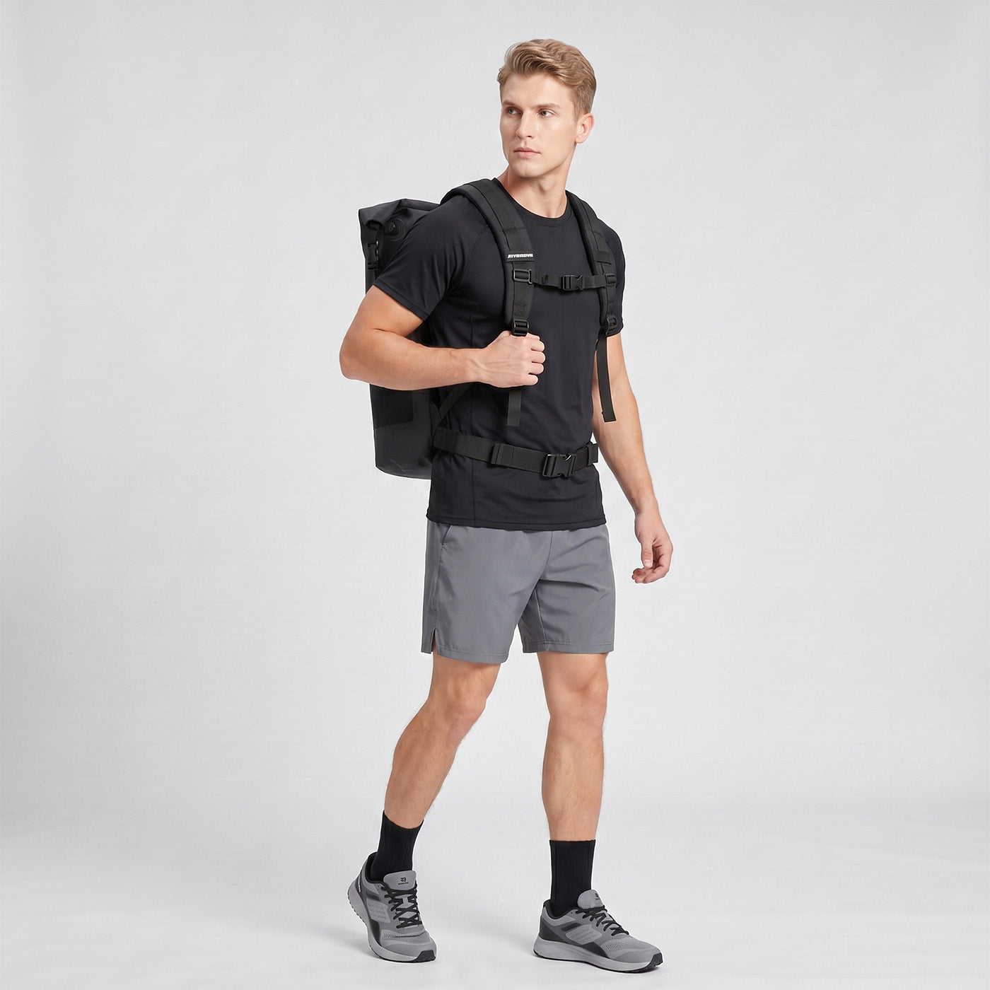 Rivonova waterproof roll-top backpack cooler black with adjustable chest and waist straps