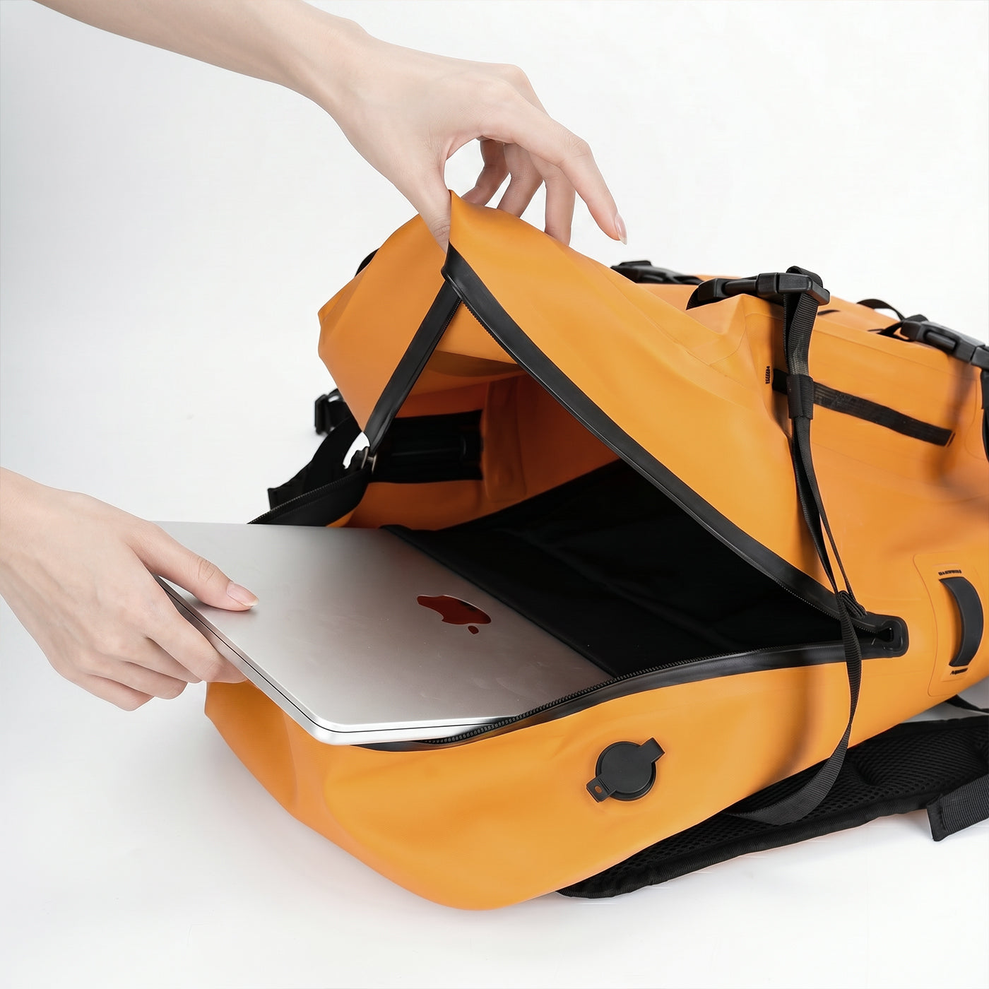RIVONOVA 30L Waterproof Backpack in Orange with laptop sleeve detail