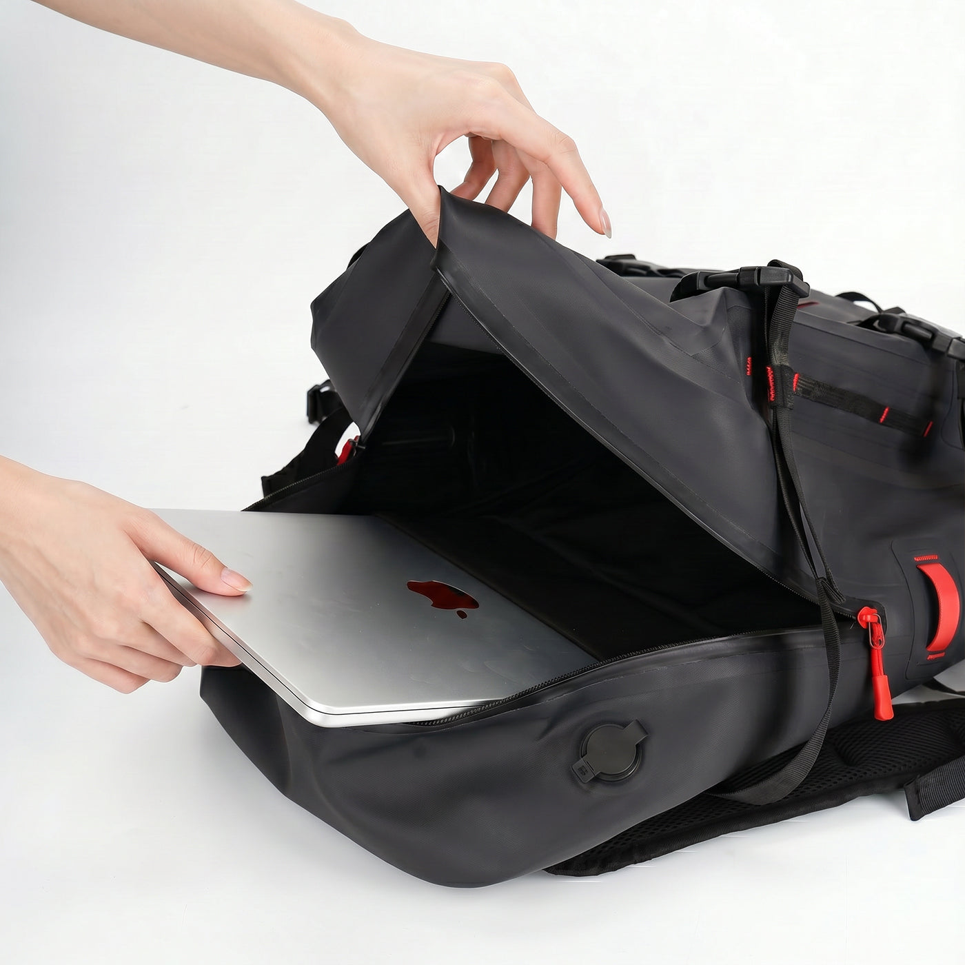 RIVONOVA 30L Waterproof Backpack in Black with laptop sleeve detail