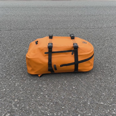 Rivonova's durable waterproof backpack remained completely unharmed after being run over by a car.